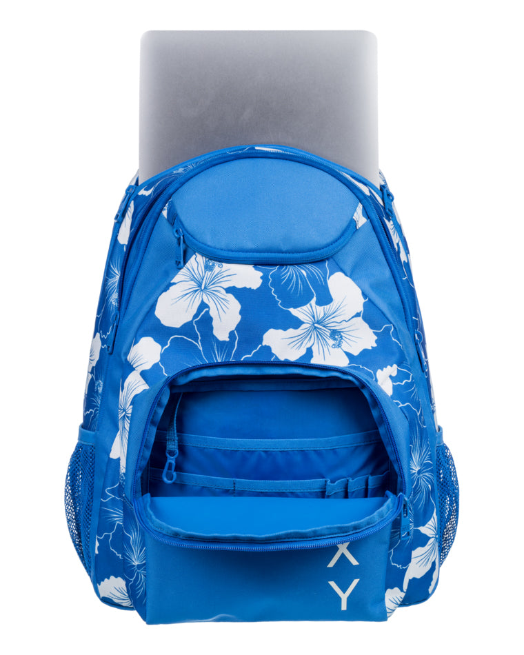 Blue Roxy backpack with a white floral print, open compartments showing a laptop sleeve, organizer pockets, and mesh sides.