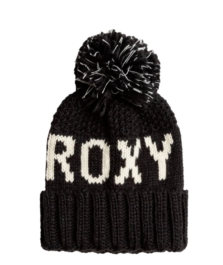 Black knitted beanie with white 'ROXY' text and a black-and-white pom-pom on top, featuring a ribbed fold-over cuff.
