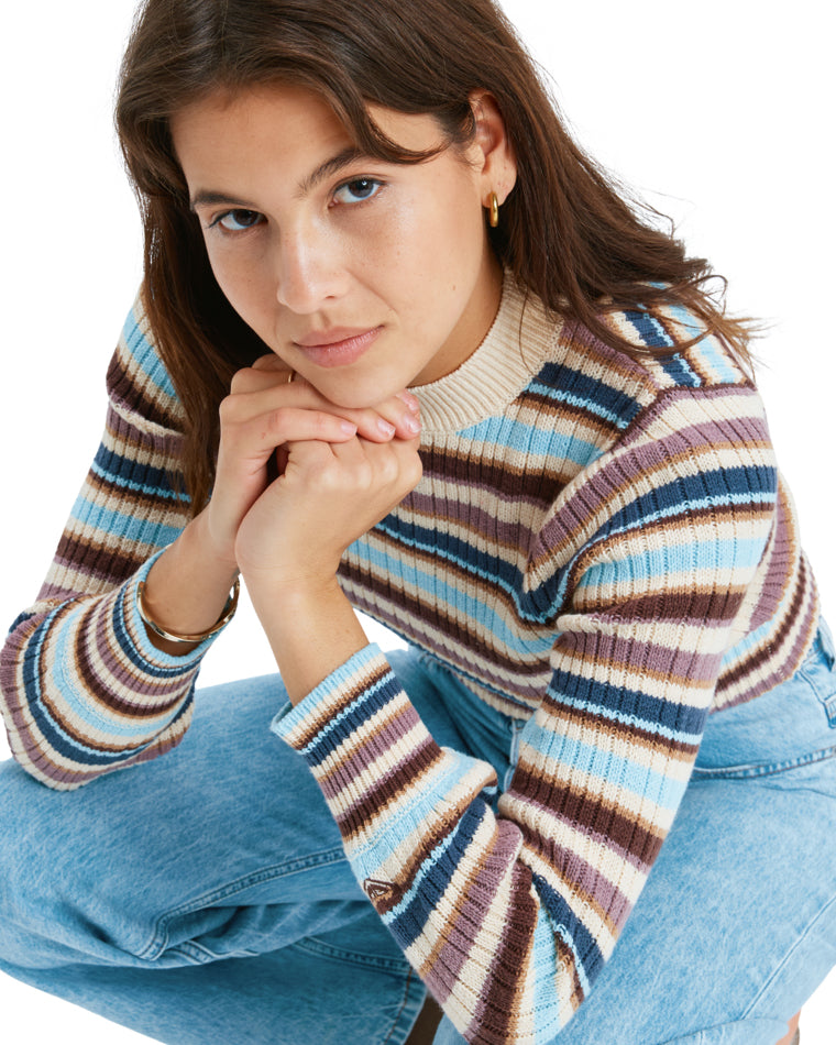 Close-up of multicolour striped rib knit jumper with mock neck collar