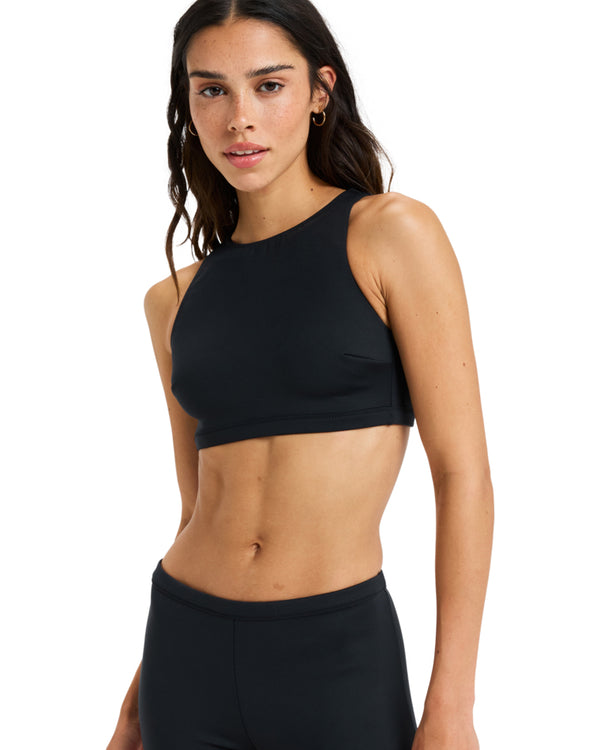 Black high neck Roxy swim top with cropped fit and wide shoulder straps.