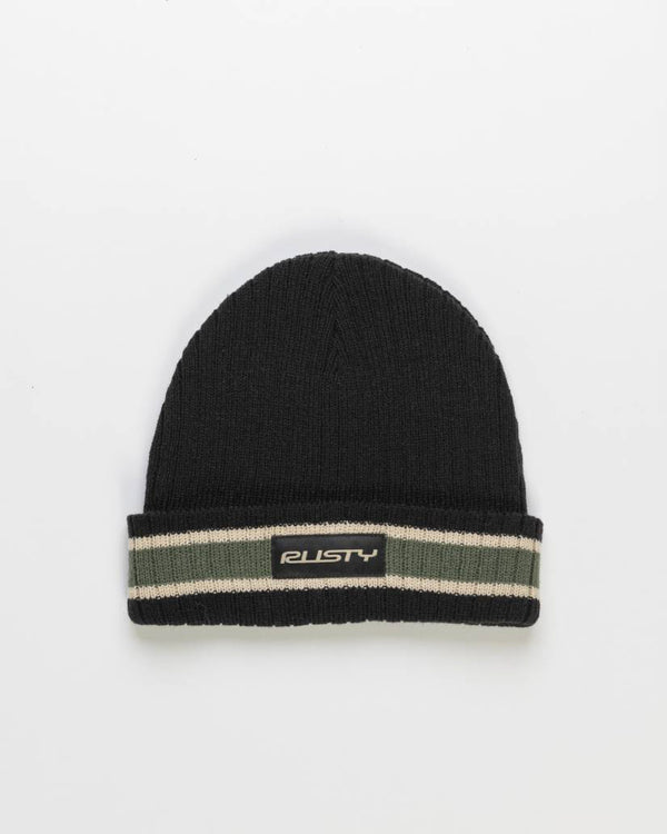 Black knitted beanie with a striped fold-over cuff in green and beige, featuring a 'Rusty' logo patch on the front.