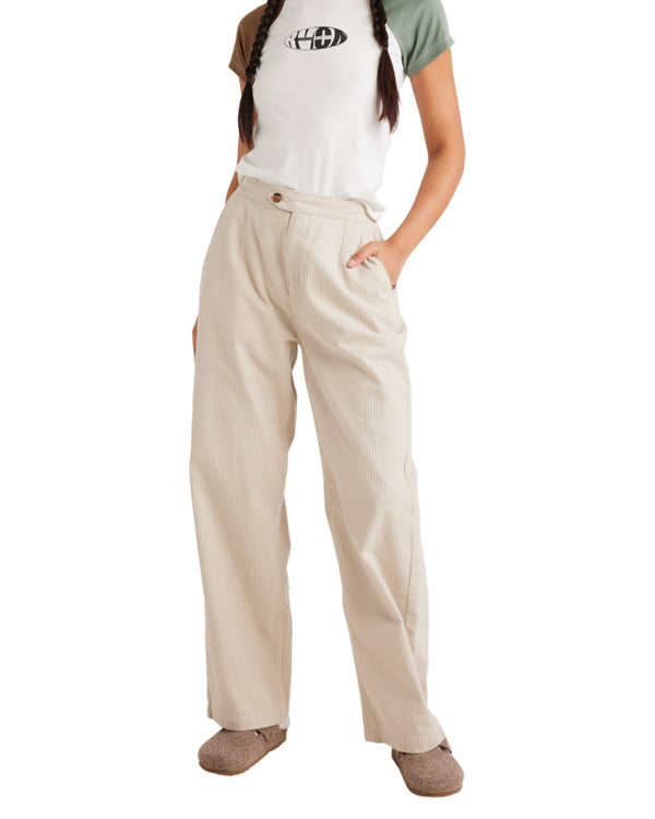 High-waisted beige pants with a relaxed fit, subtle stripes, and button closure, styled with casual shoes.