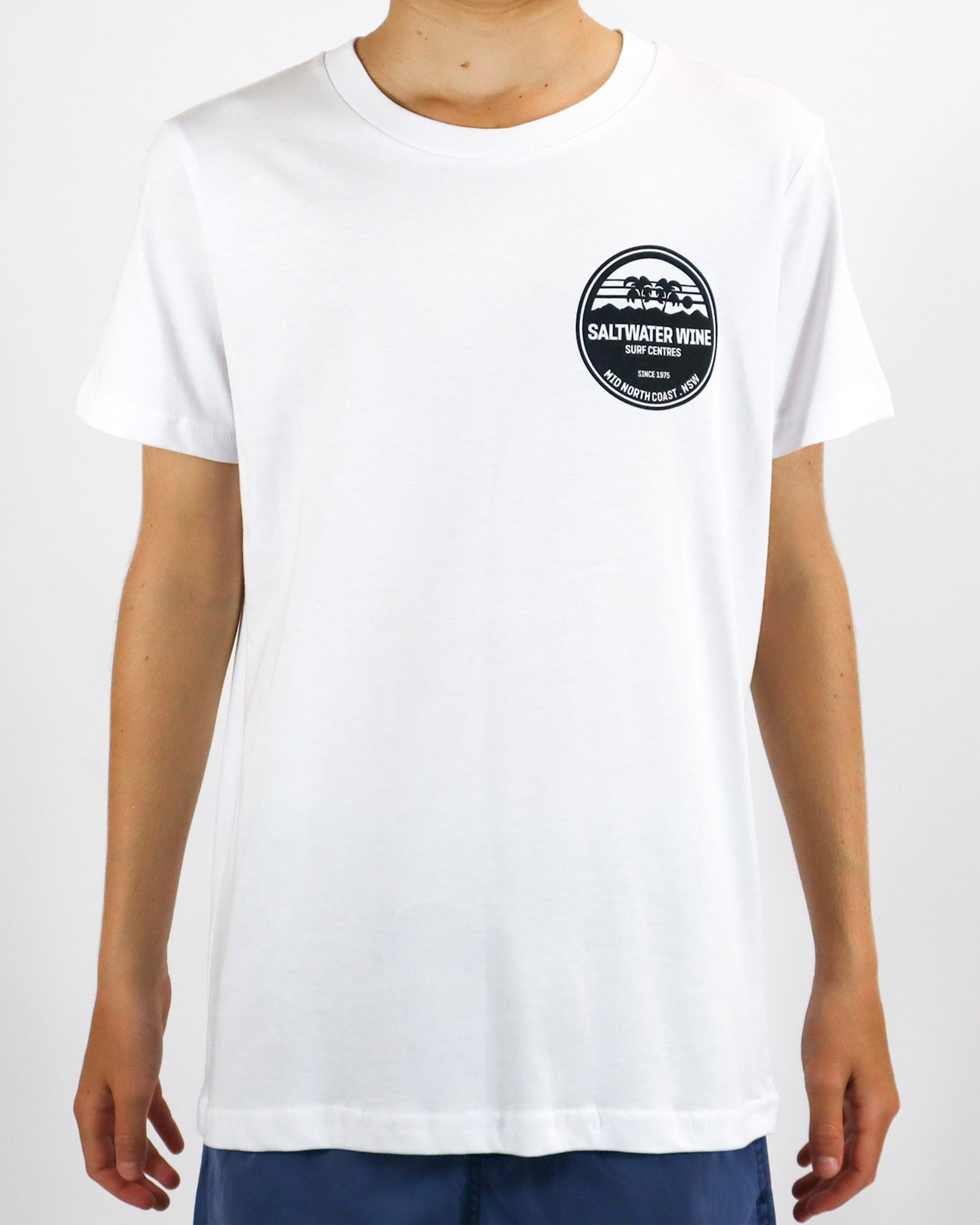 White short sleeve t-shirt with black Saltwater Wine chest logo, worn with blue shorts.