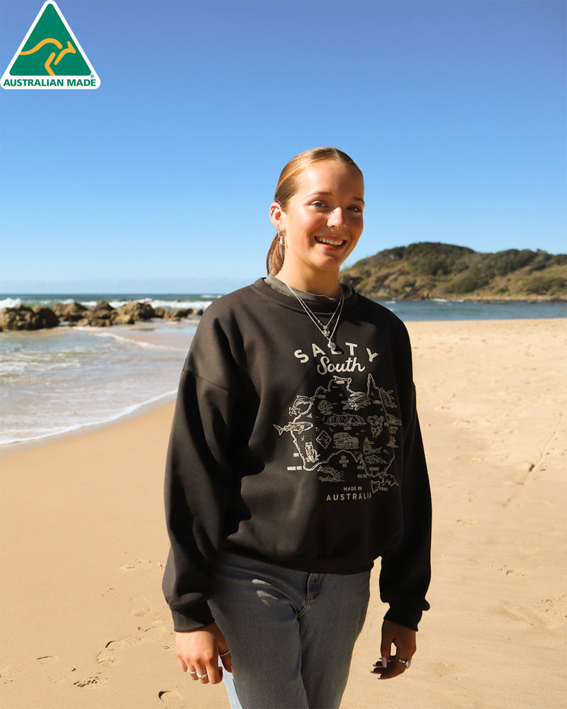 Charcoal Salty South crewneck with cream Australia map print, made in Australia and worn at the beach
