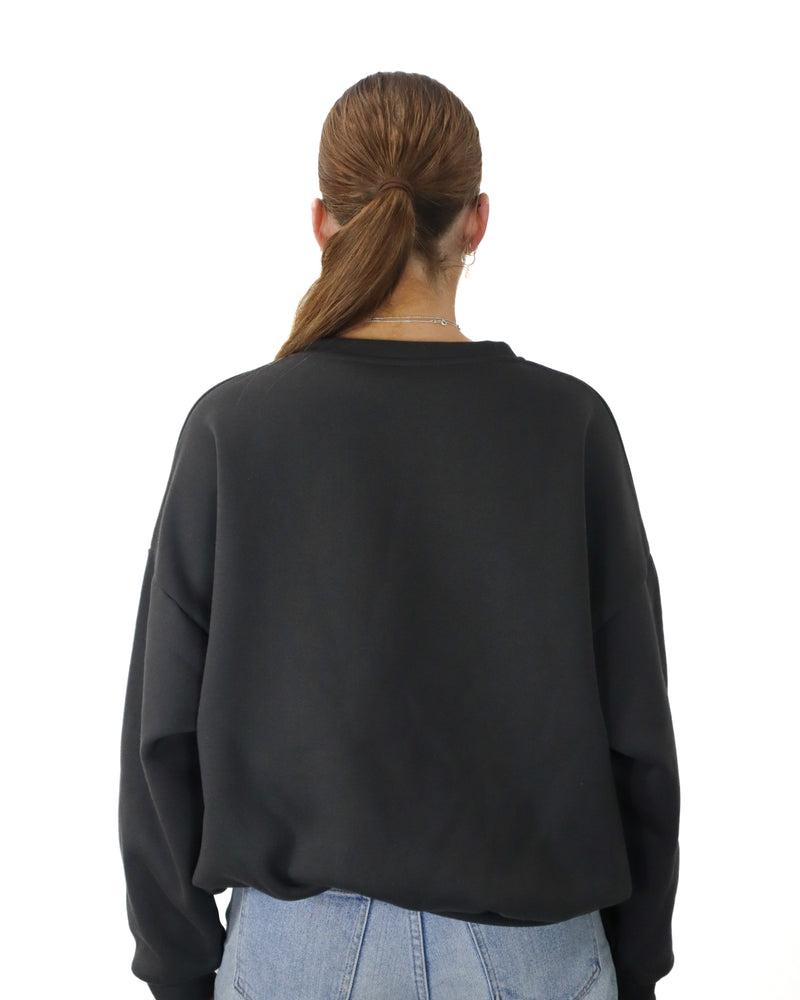 Back view of charcoal Salty South crewneck with plain design and dropped shoulder cut