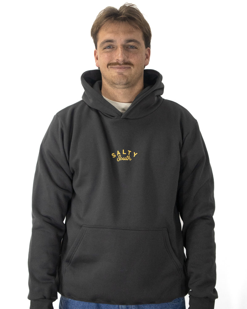 Front view of charcoal Salty South hoodie with small gold embroidered logo on chest