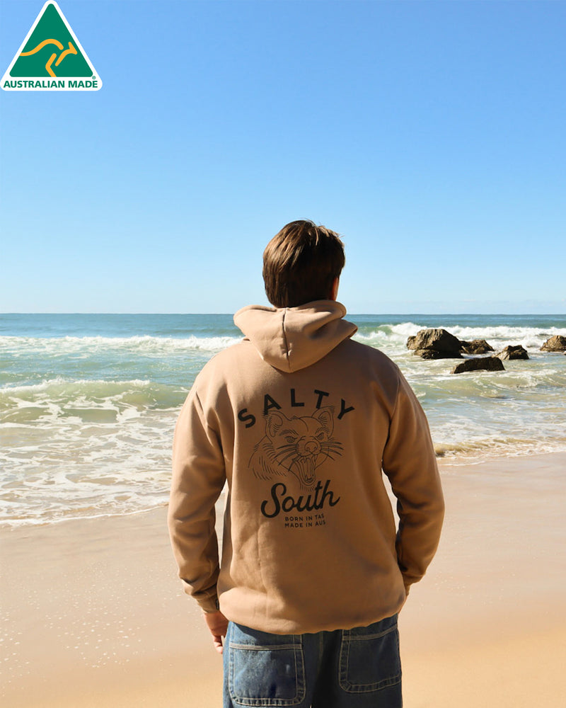 Tan Salty South hoodie with Tasmanian devil graphic and text born in TAS, made in AUS.