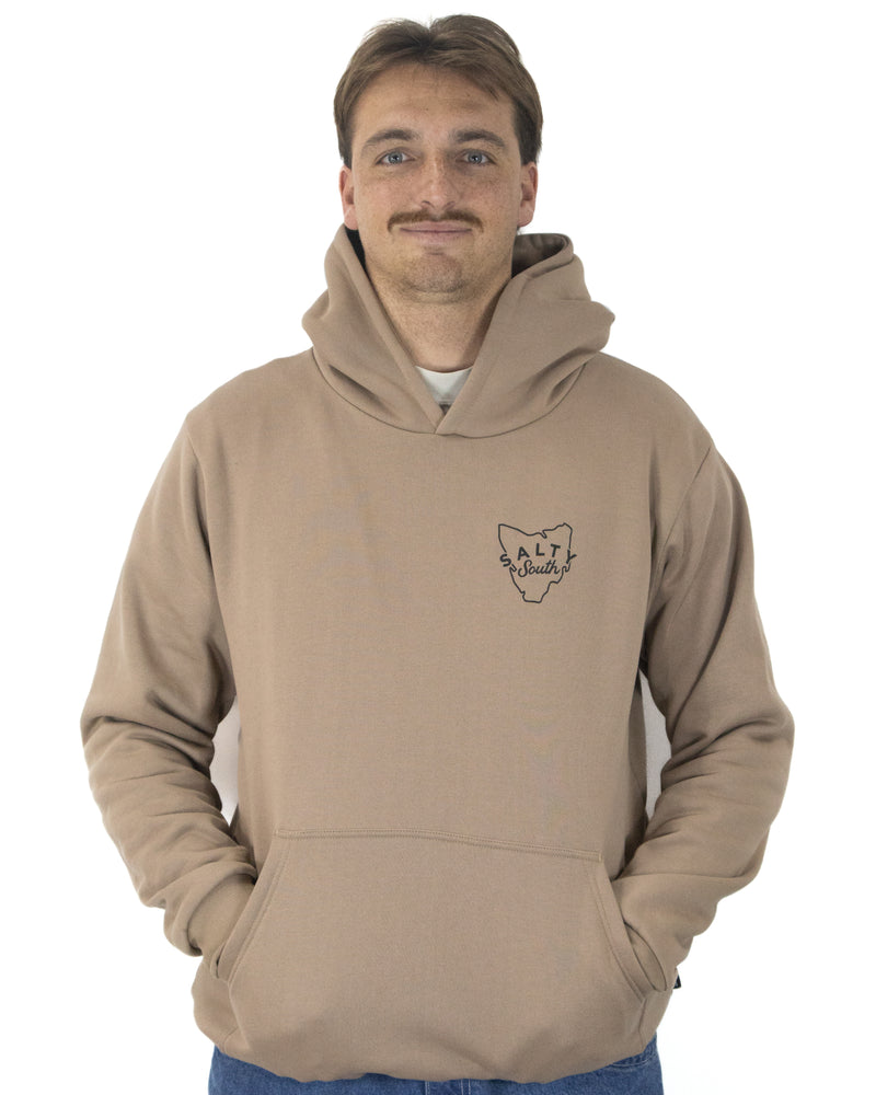 Front view of tan Salty South hoodie with Tasmania outline and chest logo