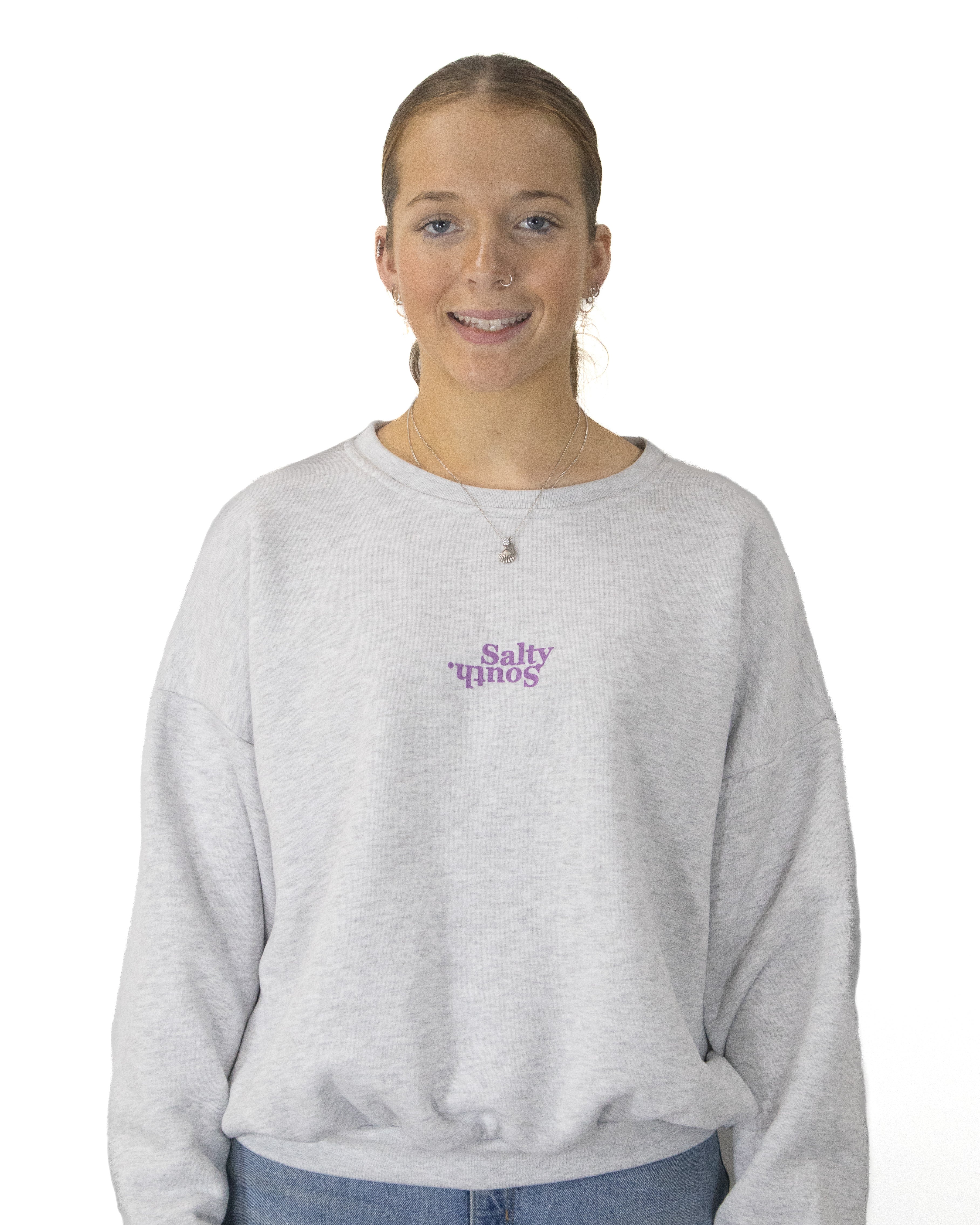 Studio shot of grey Salty South jumper with purple front logo, relaxed fit and soft fleece for everyday wear.