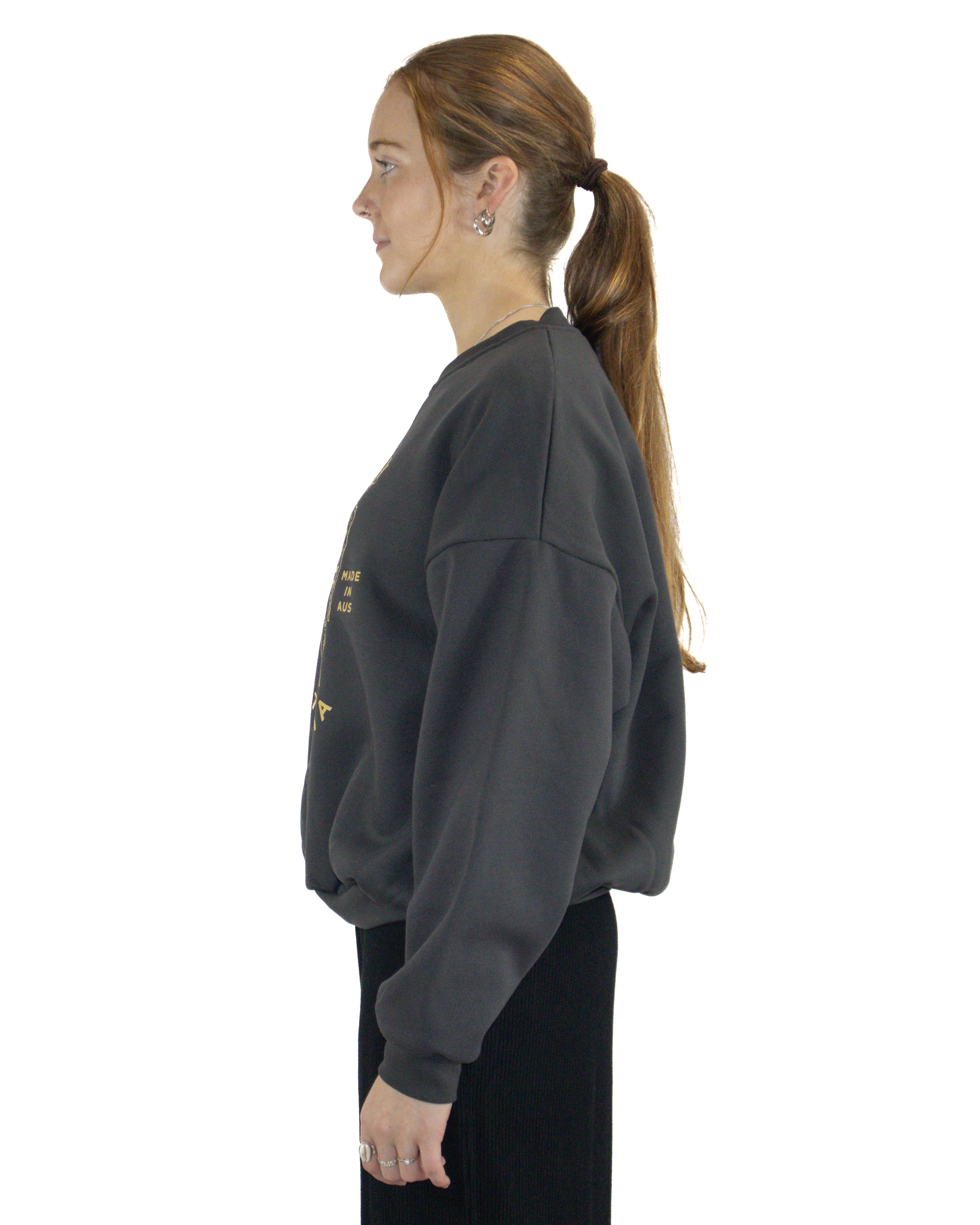 Side view of charcoal Salty South sweatshirt with oversized fit and ribbed cuffs.