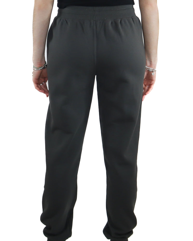 Back view of charcoal Storm Riders track pants with elastic waistband.