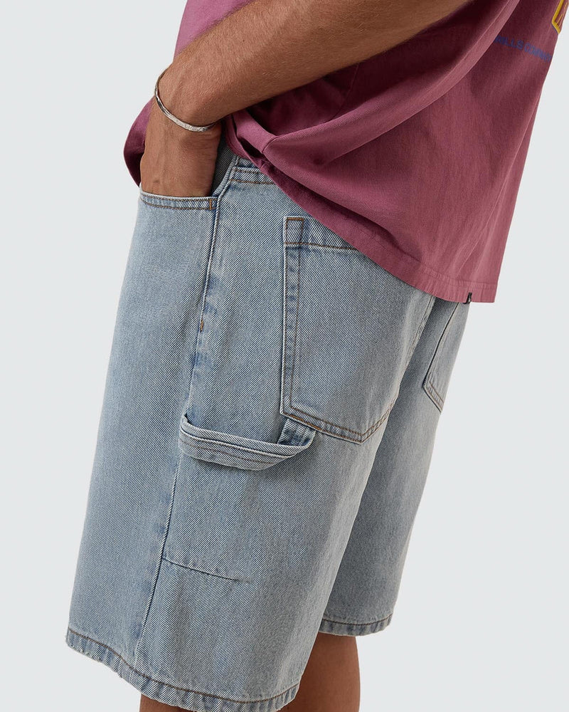 Light blue denim shorts with a side utility pocket and visible stitching detail.