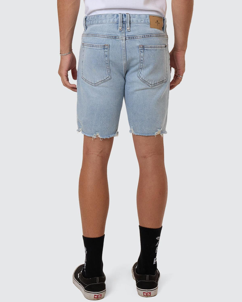 Back view light blue Thrills denim shorts with patch logo