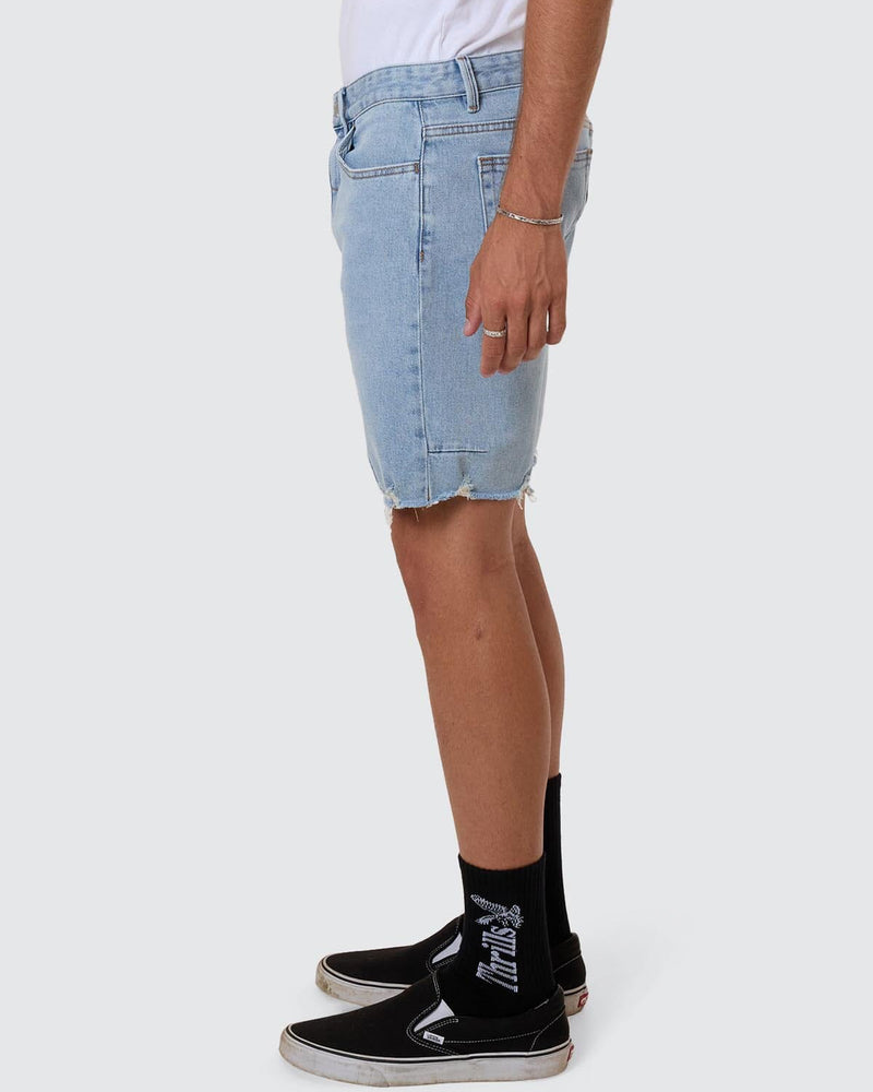 Side view light blue Thrills raw hem denim shorts