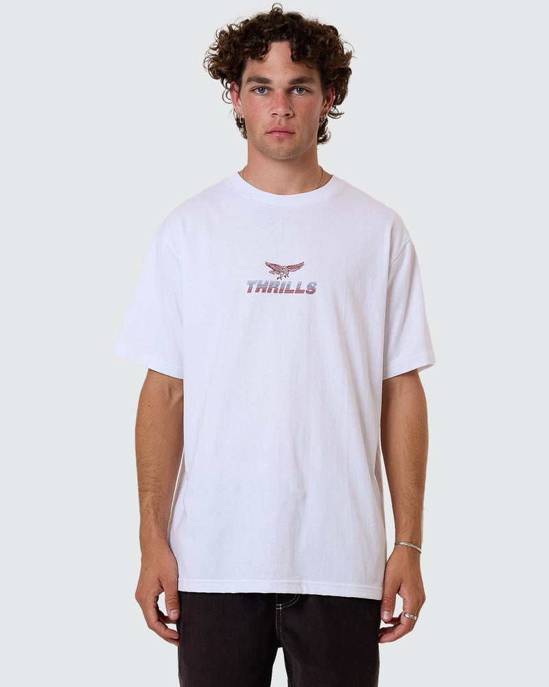 White oversized tee with small Thrills eagle logo on chest
