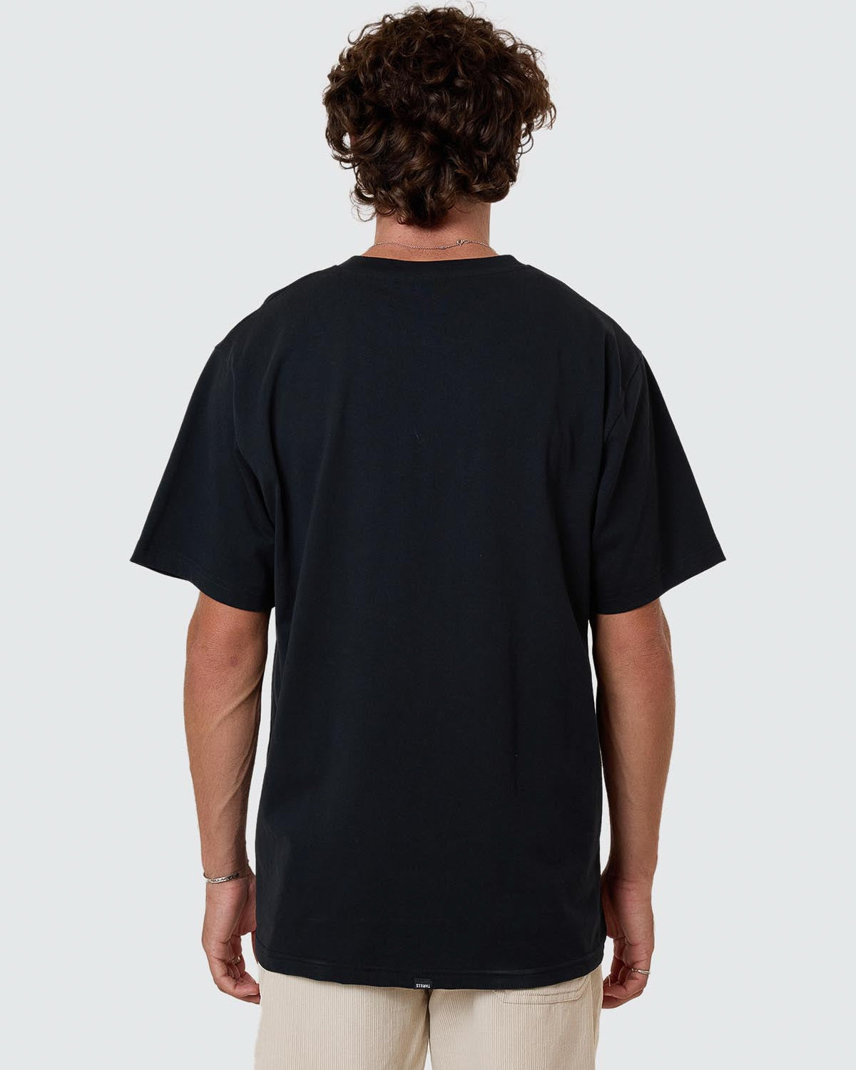 Back view of plain black short sleeve crew neck t-shirt