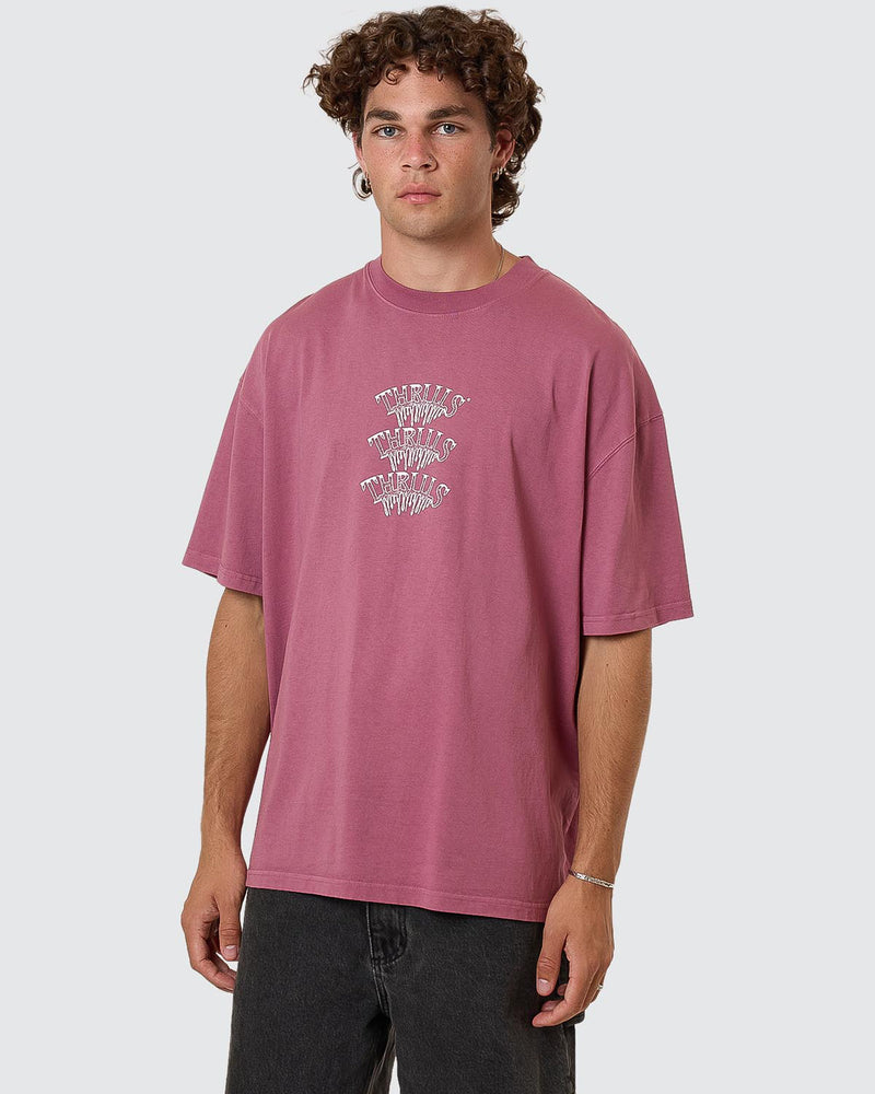 Pink graphic tee with small Thrills logo print on chest