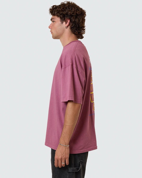 Side view of pink graphic tee with relaxed oversized fit