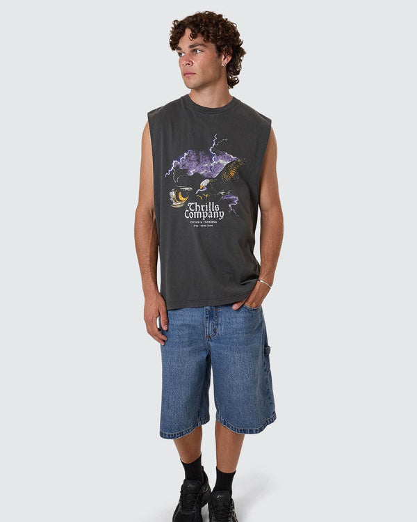Faded black sleeveless Thrills Company graphic tee styled with denim shorts and black sneakers
