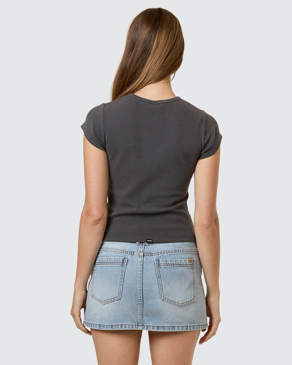 Light wash denim mini skirt with front pockets and belt loops