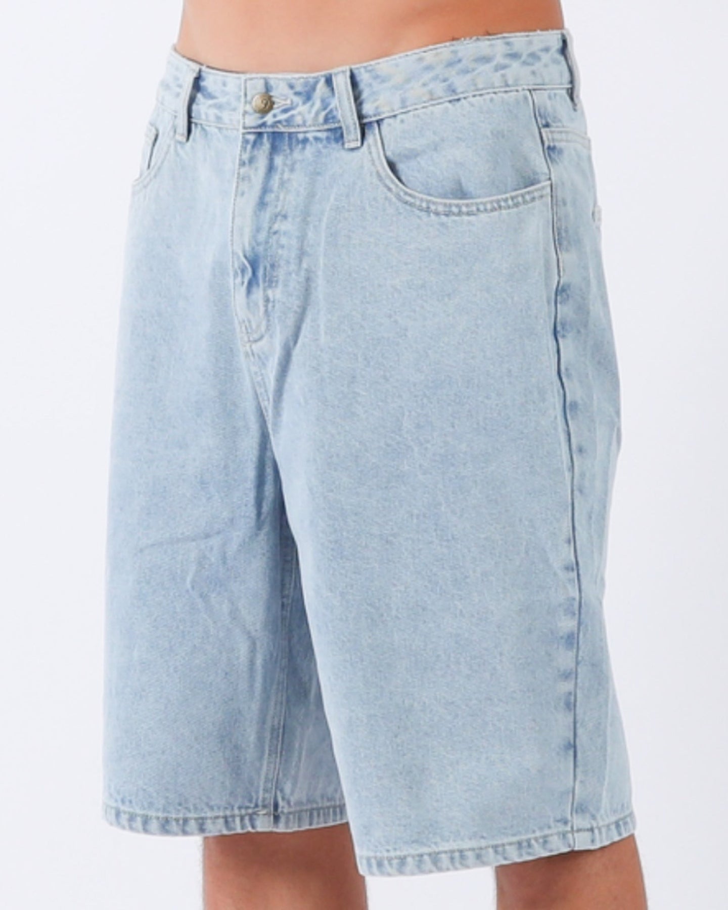 Side view of relaxed fit light blue denim shorts in washed denim