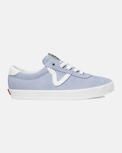 Light blue low-top sneakers with white laces, a white wave design, white sole, and red heel accent for a casual look.