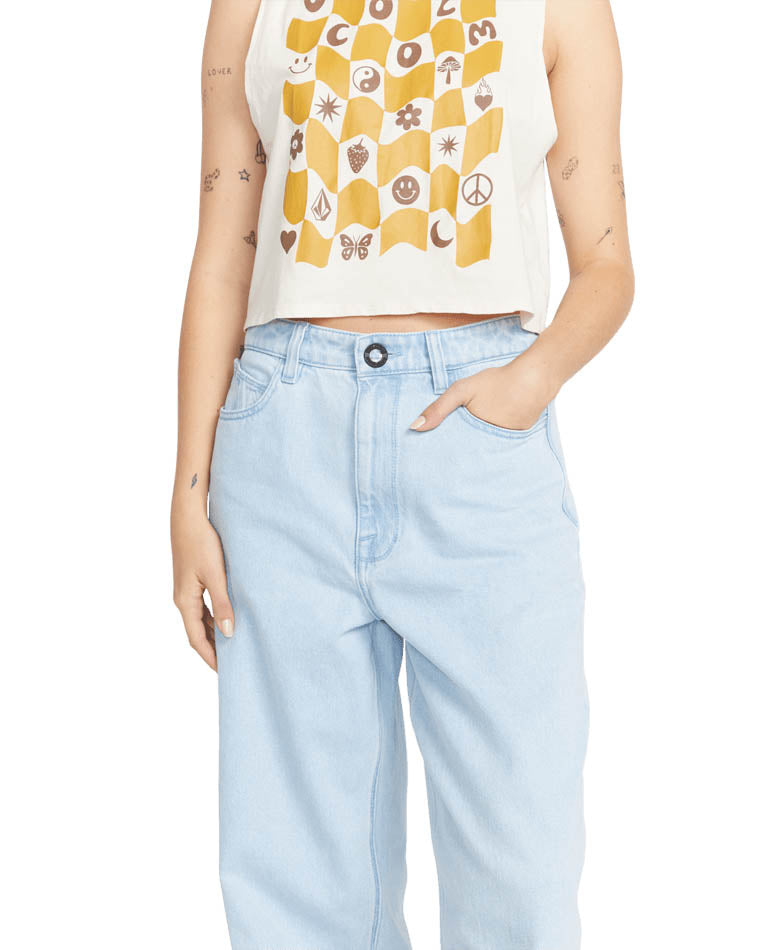 High-waisted light blue jeans with a relaxed straight-leg fit, styled with a graphic crop top featuring a yellow checkered design.