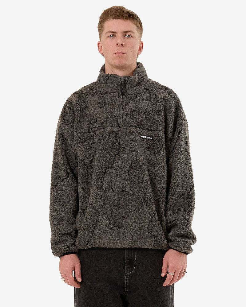 Men's dark grey sherpa fleece pullover with a subtle camouflage pattern, high collar, and a small logo patch on the chest.