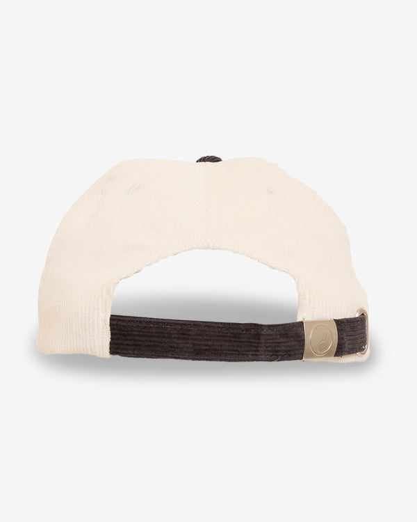 Back view of a two-tone corduroy cap with an adjustable brown strap and metal buckle, featuring a cream-colored crown.