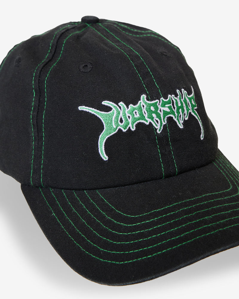 Close-up of black cap with "Worship" logo in green embroidery and green stitching on the brim.