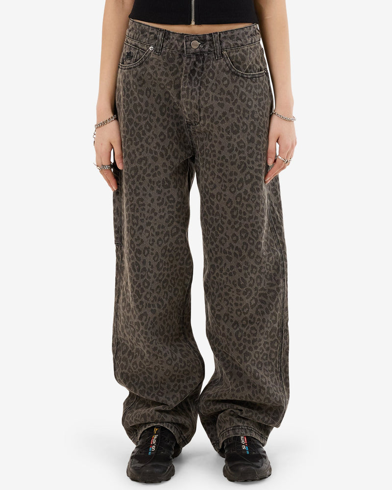 Baggy, wide-leg jeans in a faded leopard print, featuring a relaxed fit with classic five-pocket styling and button closure.