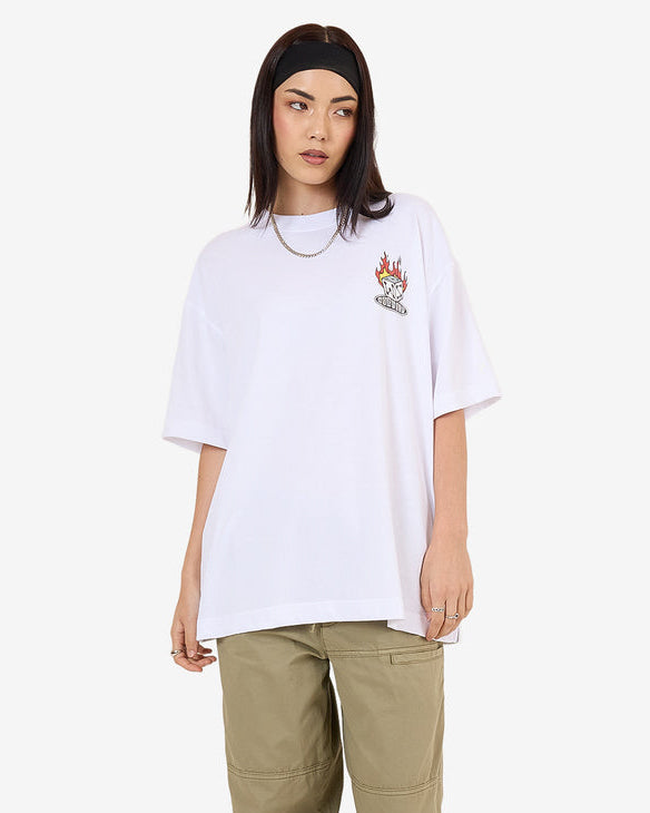 White oversized flaming dice Worship graphic tee styled with khaki pants