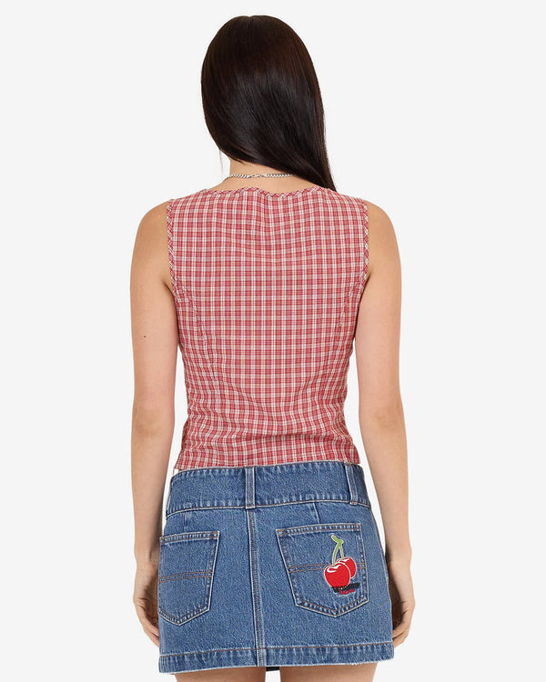 Back view of red check sleeveless top with fitted design and straight hem