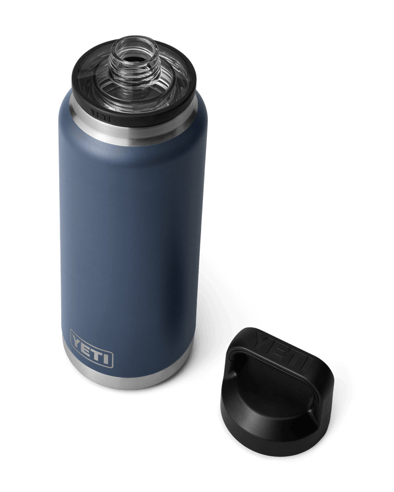 Navy blue Yeti water bottle with the lid removed, showcasing a wide-mouth opening, stainless steel design, and insulated build.